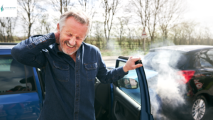 Man in a car accident with whiplash